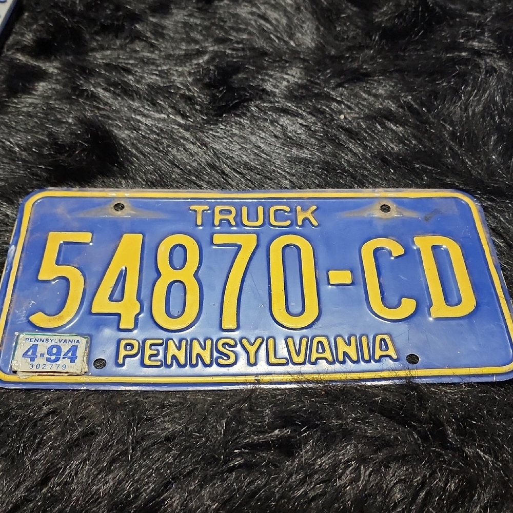 Blue and Yellow Pennsylvania Truck License Plate. Vintage 1994.